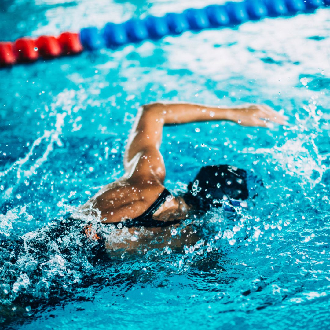 woman swimming in a lap pool
