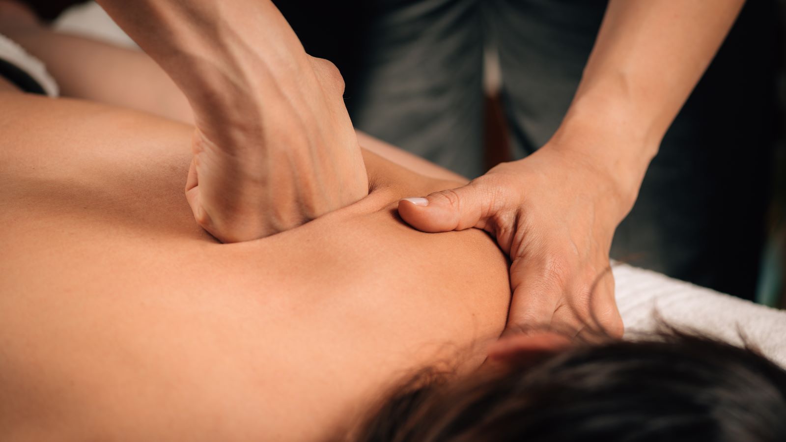 woman getting a deep tissue massage
